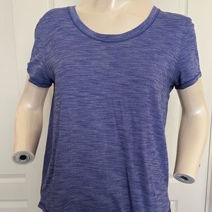 Lululemon top. Beautiful violet color. Comfortable. Like new.